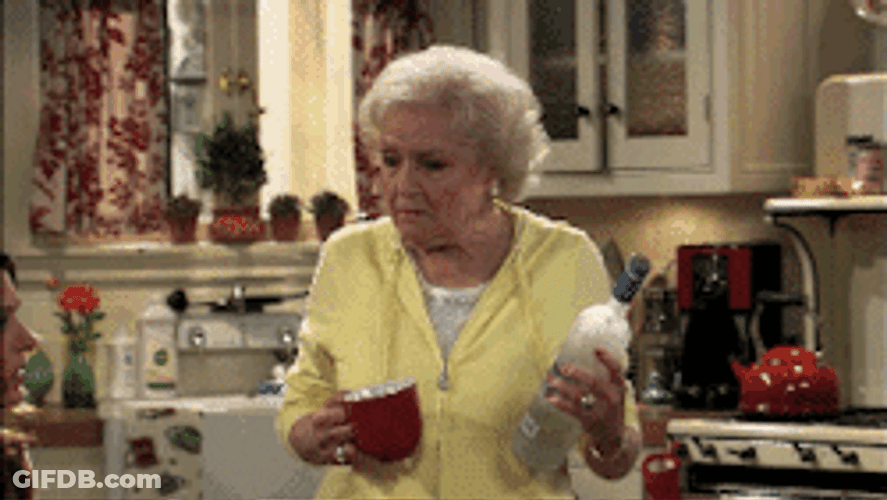 Betty White Pours Two Shots Of Vodka GIF