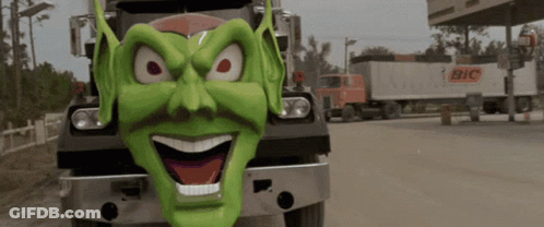 Bic Truck In Front Of Green Monster GIF