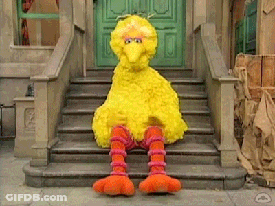 Big Bird From Sesame Street Sitting On Steps GIF