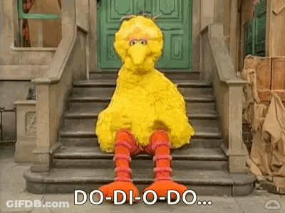 Big Bird Sitting On Stairs GIF