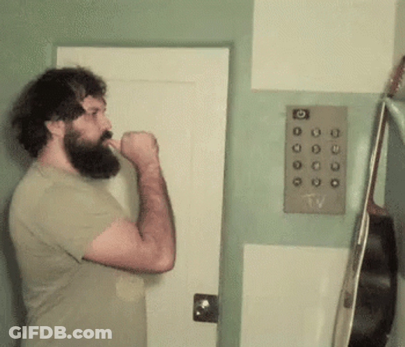 Big Head Man Sucking His Finger GIF