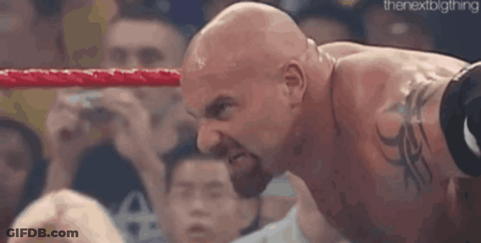 Bill Goldberg Bent Down Burning Eyes GIF
