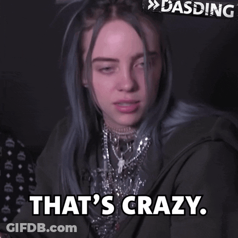 Billie Eilish In Black Jacket And Necklaces Saying That's Crazy GIF