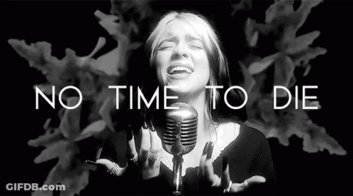 Billie Eilish Is Singing Into A Microphone In A Black And White Photo With The Words `` No Time To Die '' . GIF