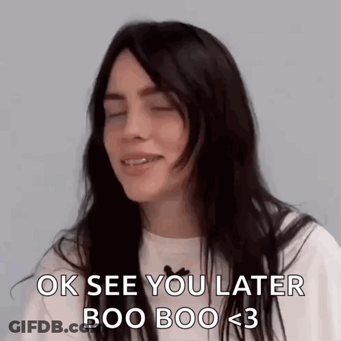 Billie Eilish Is Smiling And Saying `` Ok See You Later Boo Boo < 3 '' With Her Eyes Closed . GIF