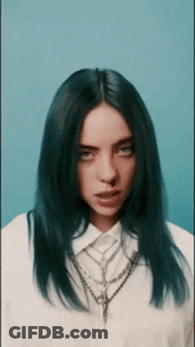 Billie Eilish Wearing White Shirt And Necklace GIF