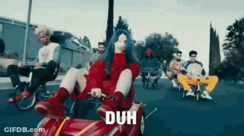 Billie Eilish Sitting In Red Car With Others GIF