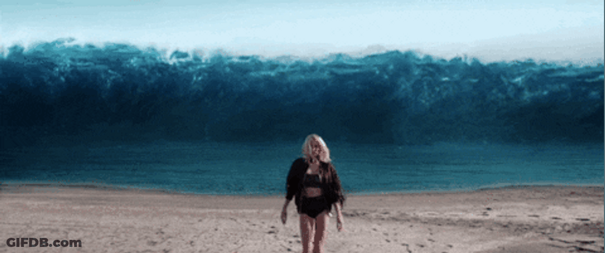 Billie Eilish Walking In Big Waves Background GIF