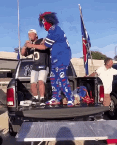 Bills Mafia Throwing Person To Smash Table GIF