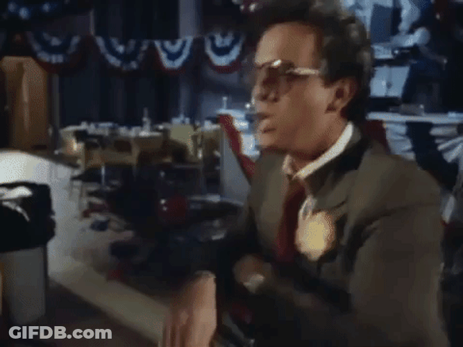 Billy Joel Music Video Taking Off Shades GIF
