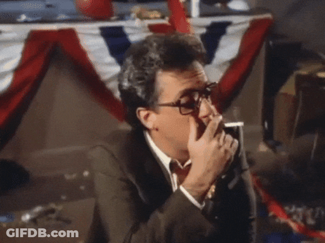 Billy Joel Smoking Cigar GIF