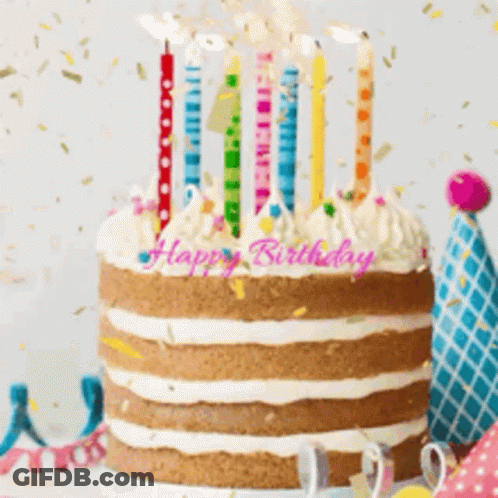 Birthday Cake With Candles And Confetti Saying Happy Birthday GIF