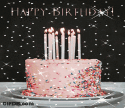 Birthday Cake With Candles And Sprinkles Saying Happy Birthday GIF