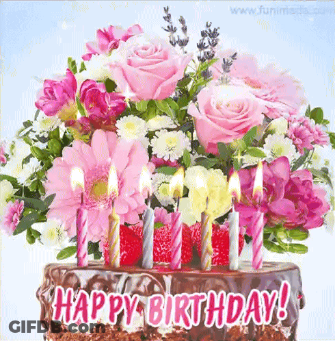 Birthday Cake With Pink Candles And Pink And White Flowers GIF