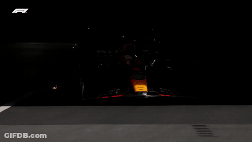 Black And Orange Race Car With Letter F GIF