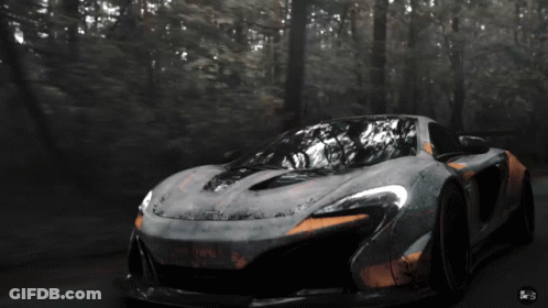 Black And Orange Sports Car Driving Forest Road GIF