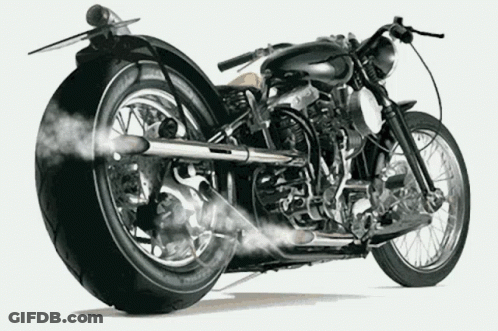 Black And Silver Motorcycle With Exhaust Smoke GIF