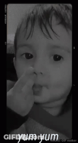 Black And White Baby Saying Yum Yum GIF