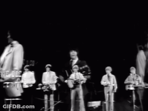 Black And White Band With Sign Saying We Are GIF