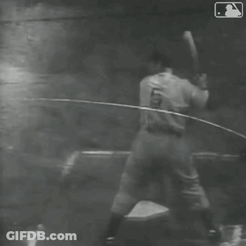 Black And White Baseball Player Running To Base GIF