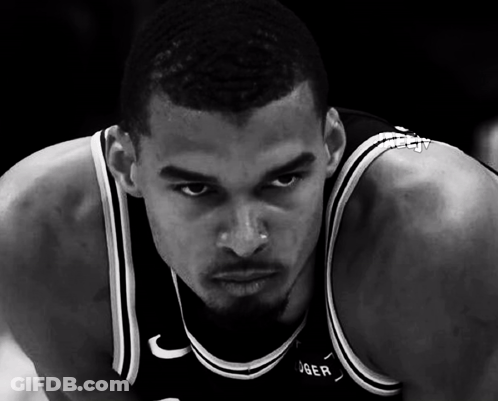 Black And White Basketball Player In Joer Jersey GIF