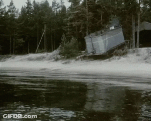 Black And White Body Of Water With Trees GIF