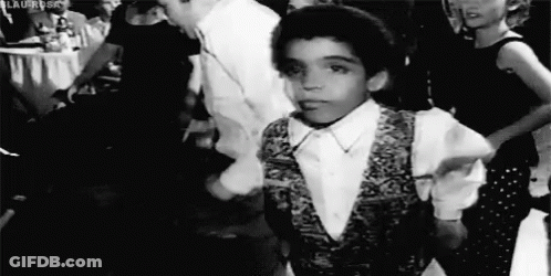 Black And White Boy Dancing In Crowd GIF