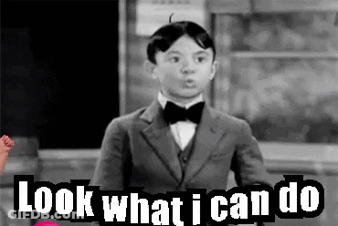 Black And White Boy In Suit And Bow Tie Saying Look What I Can Do GIF