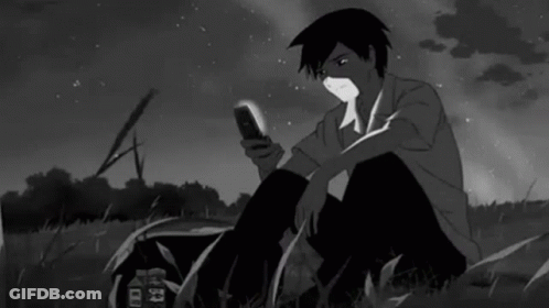 Black And White Boy Looking At Phone GIF