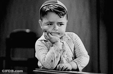 Black And White Boy With Hand On Chin GIF