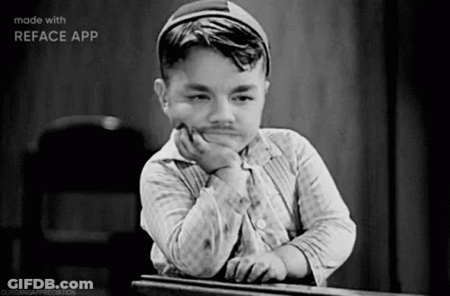 Black And White Boy With Mustache At Table GIF