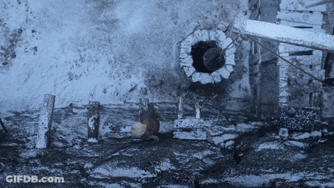 Black And White Brick Wall With Hole GIF