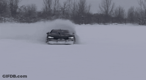 Black And White Bugatti Chiron Driving In Snow GIF
