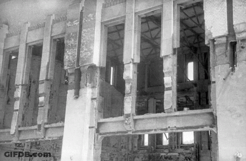 Black And White Building With Few Windows GIF