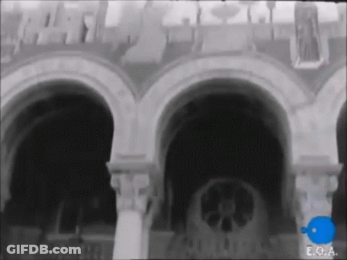 Black And White Building With Letters E.O.A GIF