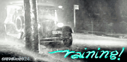 Black And White Car In Rain Saying Raining GIF