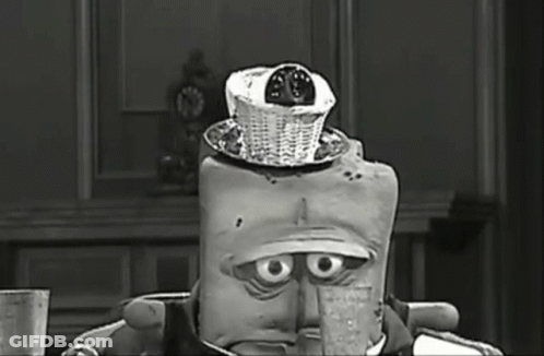 Black And White Cartoon With Basket On Head GIF