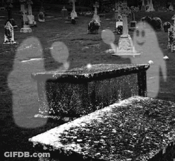Black And White Cemetery With Two Ghosts GIF