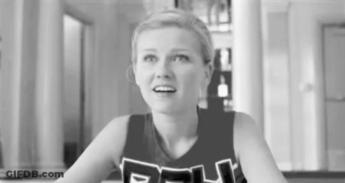 Black And White Cheerleader In Uniform GIF