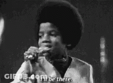 Black And White Child Singing Into Microphone GIF
