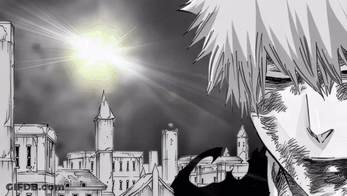 Black And White City With Sun Shining Through Buildings GIF