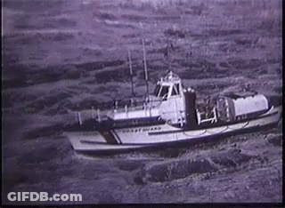 Black And White Coast Guard Boat In Water GIF