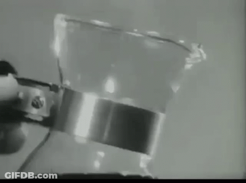 Black And White Coffee Cup With Steam And Spoon GIF