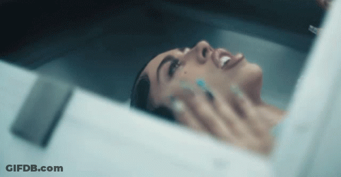 Black And White Coffin With Hand Sticking Out GIF