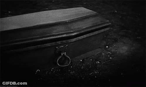 Black And White Coffin With Hand Sticking Out GIF