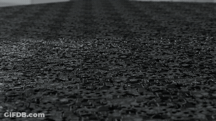 Black And White Computer Chip Surrounded By Squares GIF