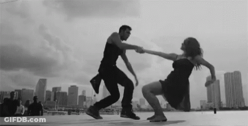 Black And White Couple Dancing On Rooftop GIF