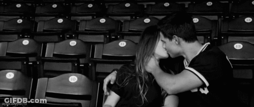 Black And White Couple Kissing In Empty Stadium Seats 10 13 GIF