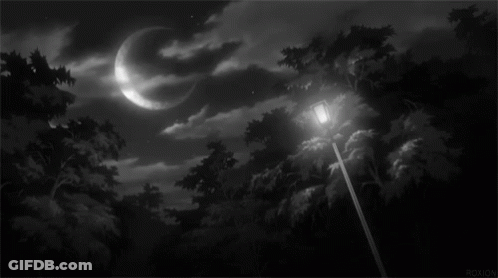 Black And White Crescent Moon In Cloudy Sky GIF