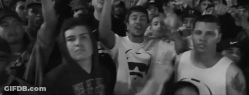 Black And White Crowd Man In Shirt Saying Be GIF